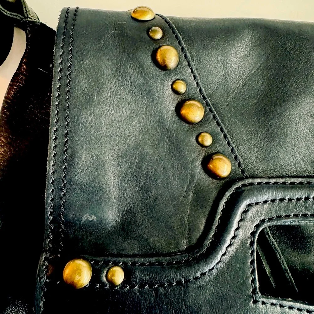 Lucky Brand Abbey fold over black leather studded messenger bag.Very Clean.